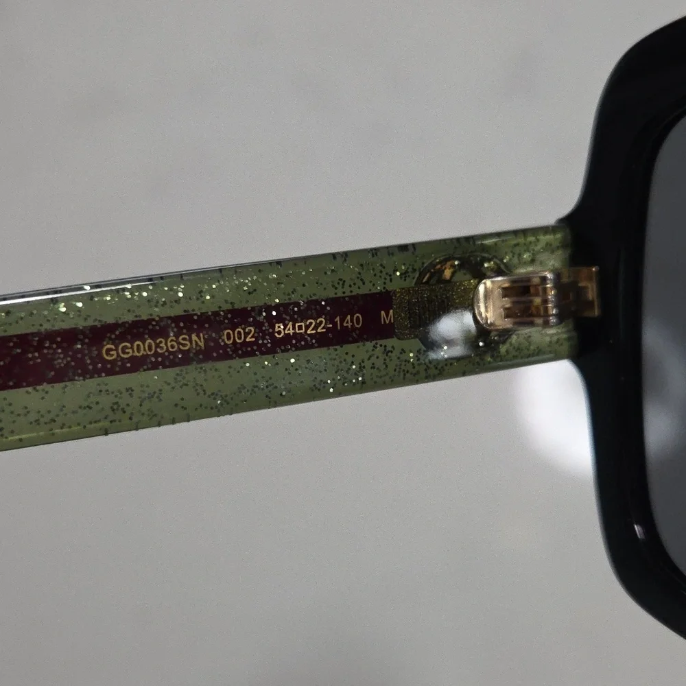 Gucci Women's Sunglasses with Black Frame and Red & Green Accents With Gold Logo